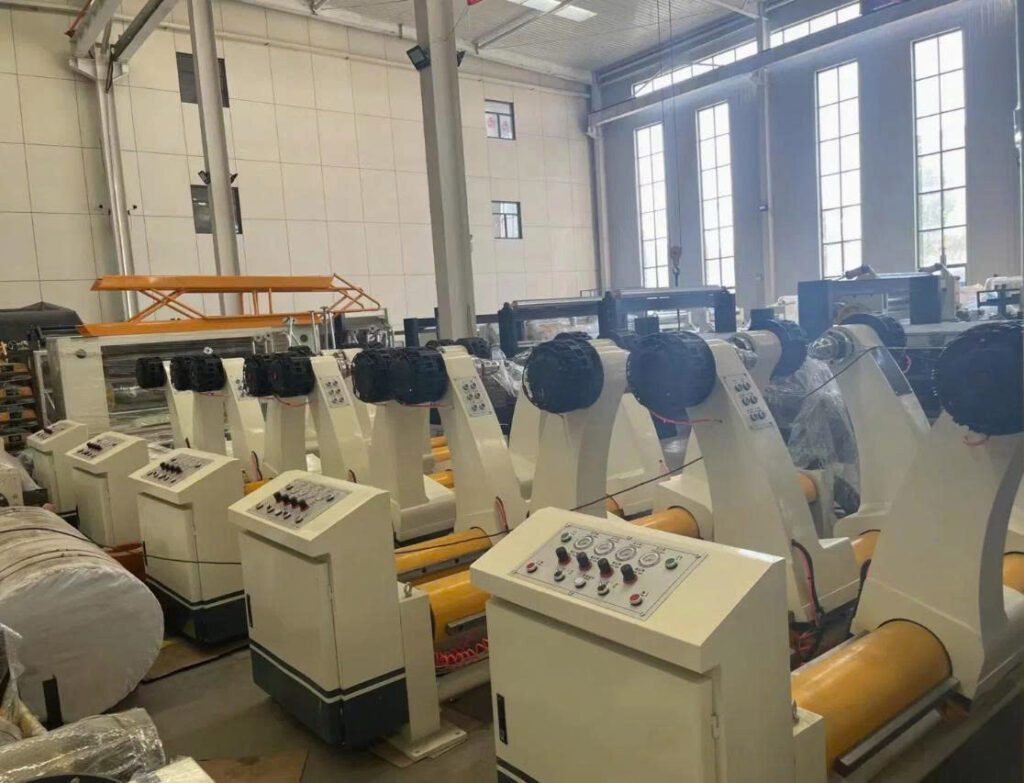 GIÁ NÂNG GIẤY VÔ TRỤC THỦY LỰC